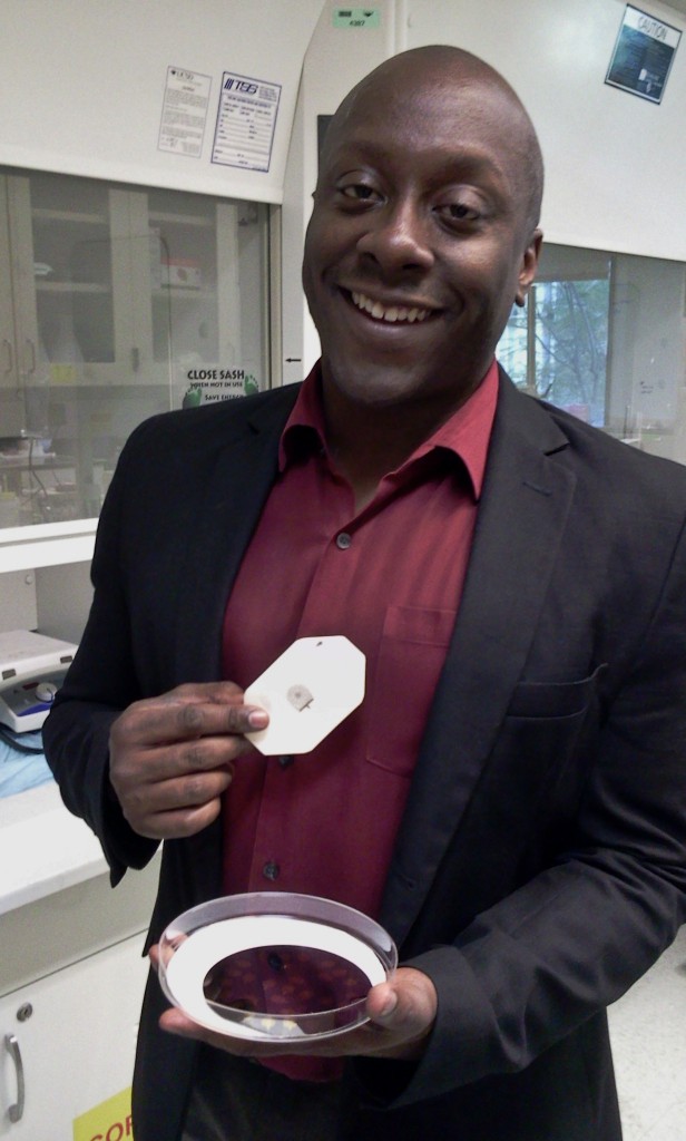 Todd Coleman shows off sensors that can be attached directly to the skin and transmit data wirelessly. (Susanne Bard)