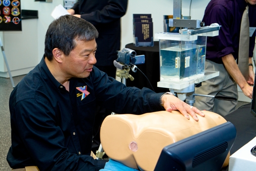 chiao_IMG_4780 Astronaut Leroy Chiao PhD tests ultrasound to reposition kidney stones in a mannequin test phantom National Space Biomedical Research Institute