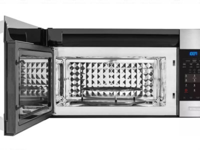 Open microwave oven with metal parts inside