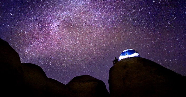 Tent under the Milky Way, San Bernardino, Caliofrnia Daniel Peckham CC BY-NC-SA2.0, via flickr, cropped
