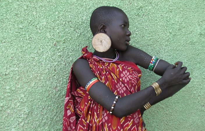 This is a Mursi woman of Nilo-Saharan ancestry. Nilo-Saharan pastoralist populations possess some of the darkest skin in Africa. Alessia Ranciaro