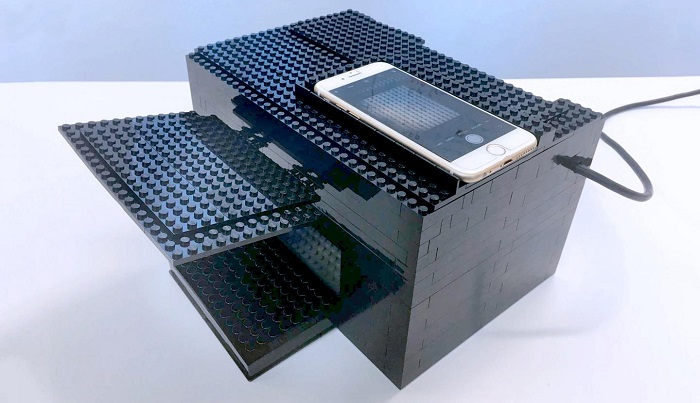 Made from Lego bricks and a smart phone, a device is connected to free software and utilizes the phone's camera to identify and detect nerve agents, like VX and sarin. (University of Texas at Austin)