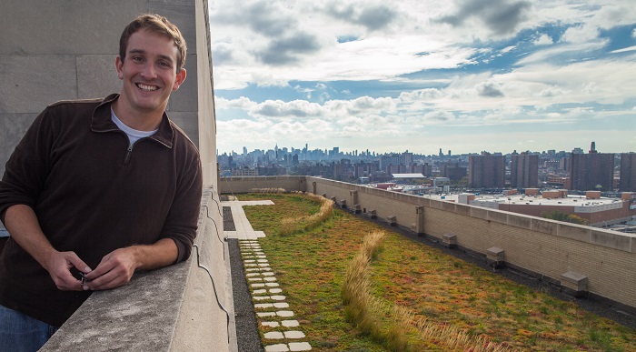 Researcher Dustin Partridge atop a green roof in New York City. (Megan Westervelt)