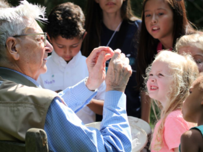 Biologist E.O. Wilson with children