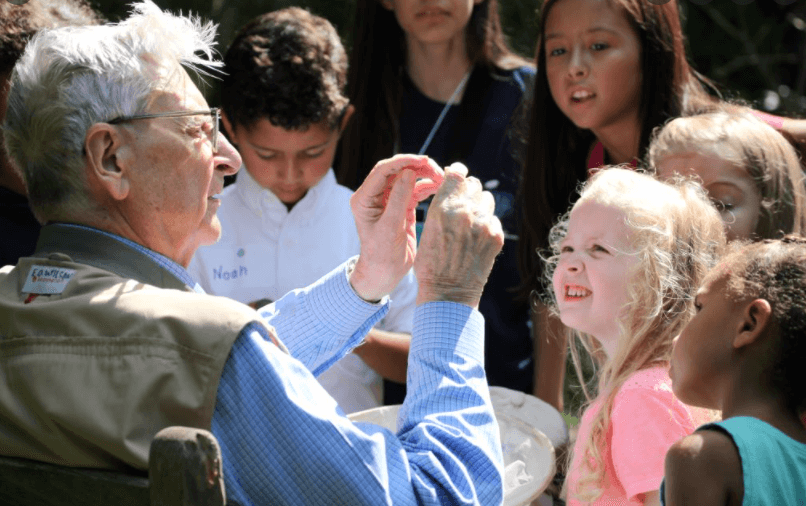 Biologist E.O. Wilson with children